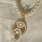 Flower pendant pearl necklace