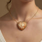 Heart cameo necklace with flowers